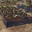 deluxe raised beds in a row from recycled plastic